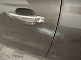 a close up of a door handle on a car