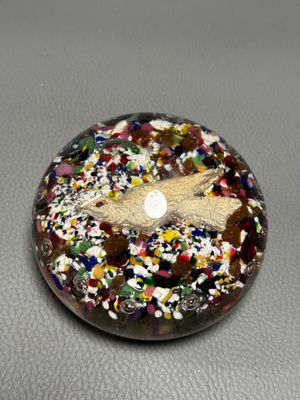 a picture of a donut with sprinkles on it