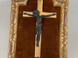 an image of a crucifix in a gold frame on a white background