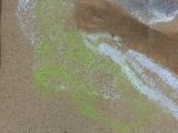 a chalk drawing of a person holding a tennis racquet