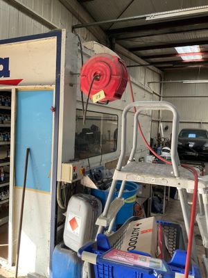 an image of a garage with a ladder and a fire hydrant