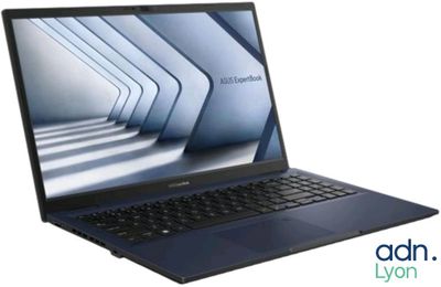 a close up of a laptop on a white surface with a blue background