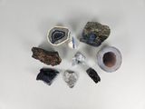 many different types of rocks and stones on the table