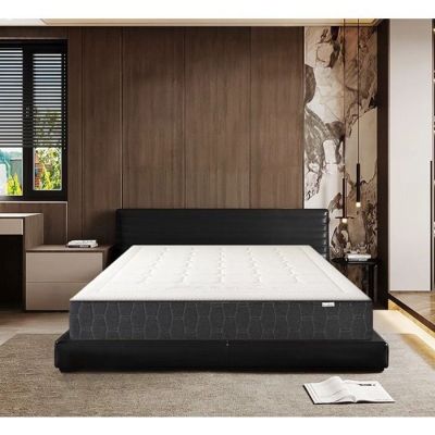an image of a bedroom with a bed and a desk in it