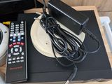 a remote control and a remote control sitting on a table