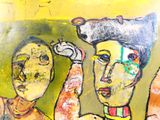 un tableau représentant un homme et une femme portant un chapeau