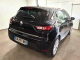 a picture of a black car parked in a garage