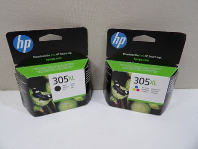 two black and color hp ink cartridges for the printer