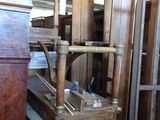 several pieces of furniture are sitting in a room with a lot of wood