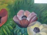 painting of three flowers on a green background with white and red petals