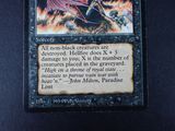 a close up of a card with a picture of a dragon on it