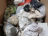 a box full of clothes and other items in it
