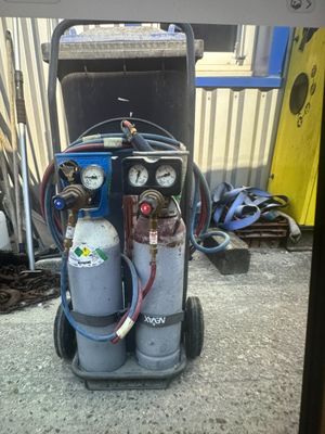an image of a proprigerator that is on a cart