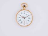 a gold pocket watch with roman numerals on the face