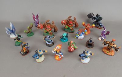 a lot of figurines that are sitting on a table