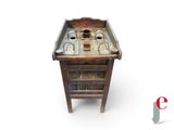 a small wooden table with cups on top of it