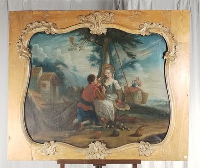une photo d'un tableau posé sur un chevalet, représentant une femme et un enfant