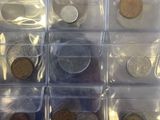 a lot of coins in the bins on the table