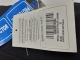 a label on the back of a black shirt