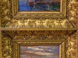 tableau représentant un bateau et un hangar à bateaux, dans un cadre doré