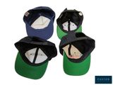 four different hats are shown in a row on a white background