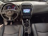 the interior of a car with a steering wheel, dashboard, and dash board