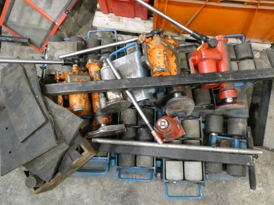 a pile of tools sitting on top of a pile of boxes