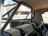 a view of the inside of a car from the passenger seat