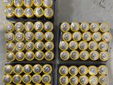 several piles of batteries are stacked on top of each other