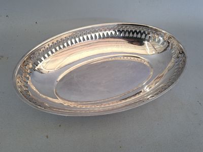 a silver plate that is sitting on a table
