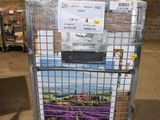 a cart with a bunch of boxes on it in a warehouse