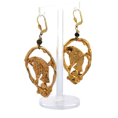 gold plated earrings with a bird in a heart and a bead