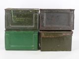 three green and brown boxes are stacked on top of each other