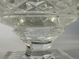 a clear glass bowl with a diamond pattern on it