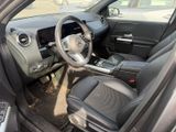 the interior of a car with a steering wheel and a dash board