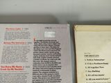 two books that are sitting next to each other on a table