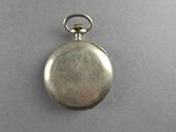 an old silver pocket watch with a chain hanging from it ' s side