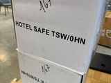 boxes stacked on top of each other on a table in a warehouse
