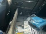 a book in the back seat of a car