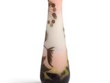 a vase that has a bird on it on a white background