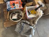 a box of tools sitting on top of a wooden pallet