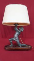 Lampe en régule pétiné orné d'un jeune garçon au pagne, h.
