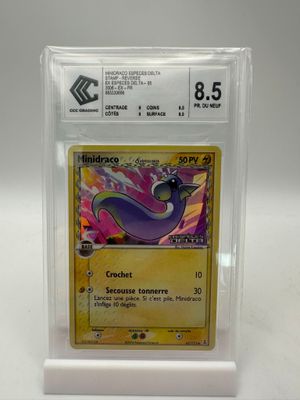 a close up of a pokemon card in a plastic case