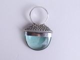 silver plated pendant with a blue glass and silver bead