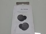 a box of ear buds sitting on a table