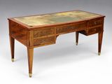 an antique writing desk with a marble top and brass - plated legs