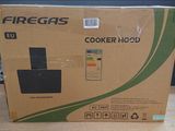 a box that is sitting on a table with a remote control