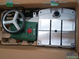 a box with a steering and a steering wheel inside of it