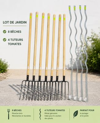 a set of four garden tools sitting on top of a gravel ground