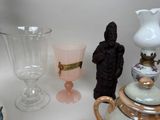 many different vases and vases sitting on a table